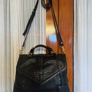 Sophisticated Black Leather Backpack with Crocodile Texture